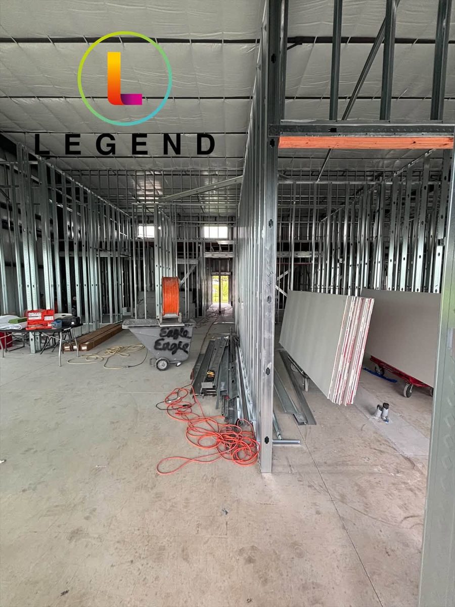 Corridor and room framing under construction at the Clearview Dental build-out in Austin, Texas.