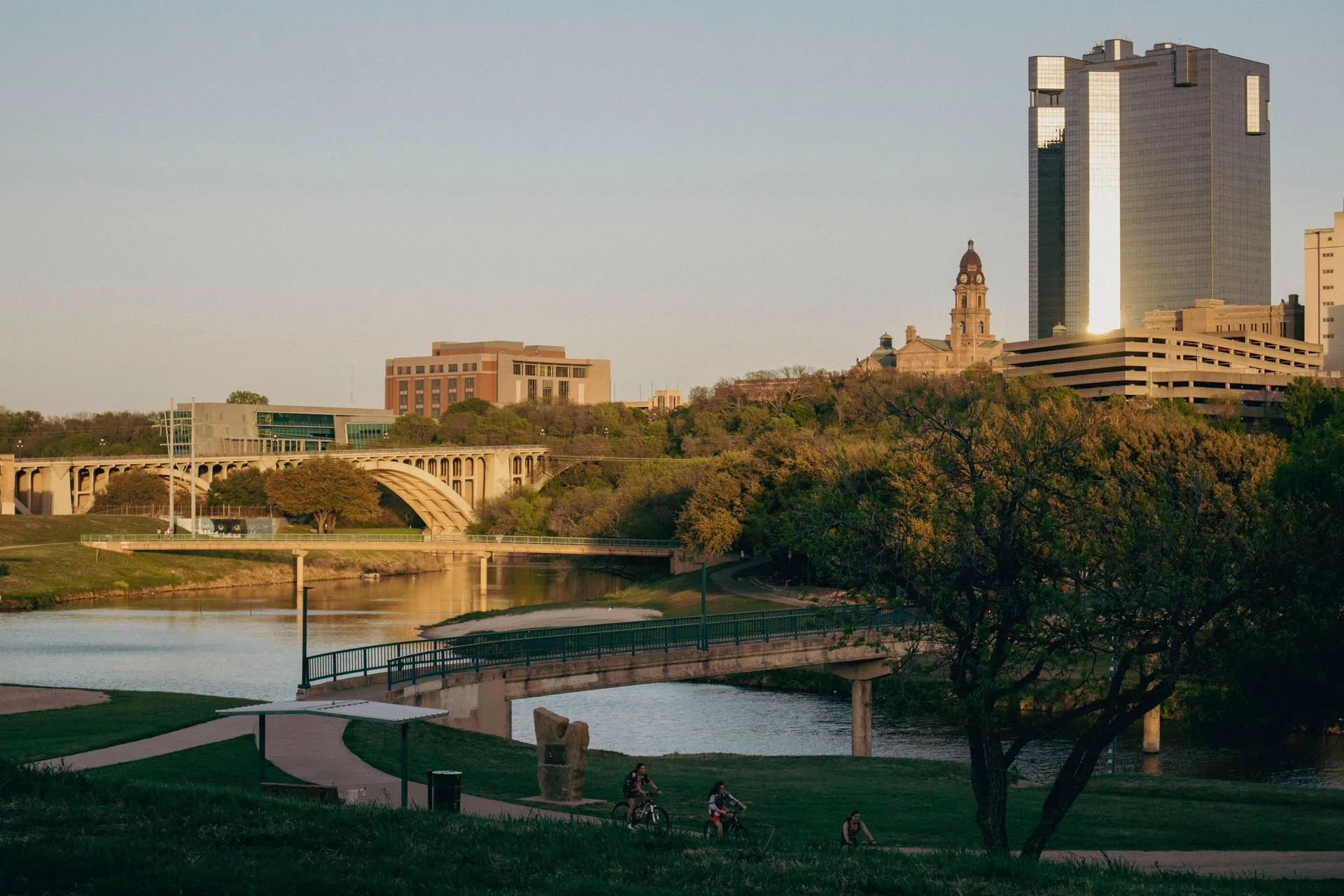 Downtown Fort Worth skyline beside the Trinity River at sunset