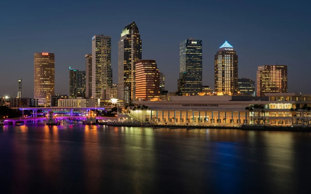 Vibrant nighttime view of the downtown Tampa skyline and waterfront