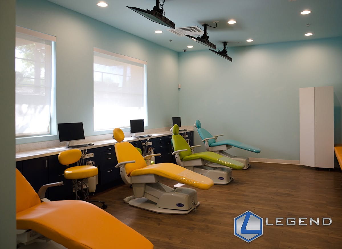 Open treatment area with colorful dental chairs at Dental Smart Kids.