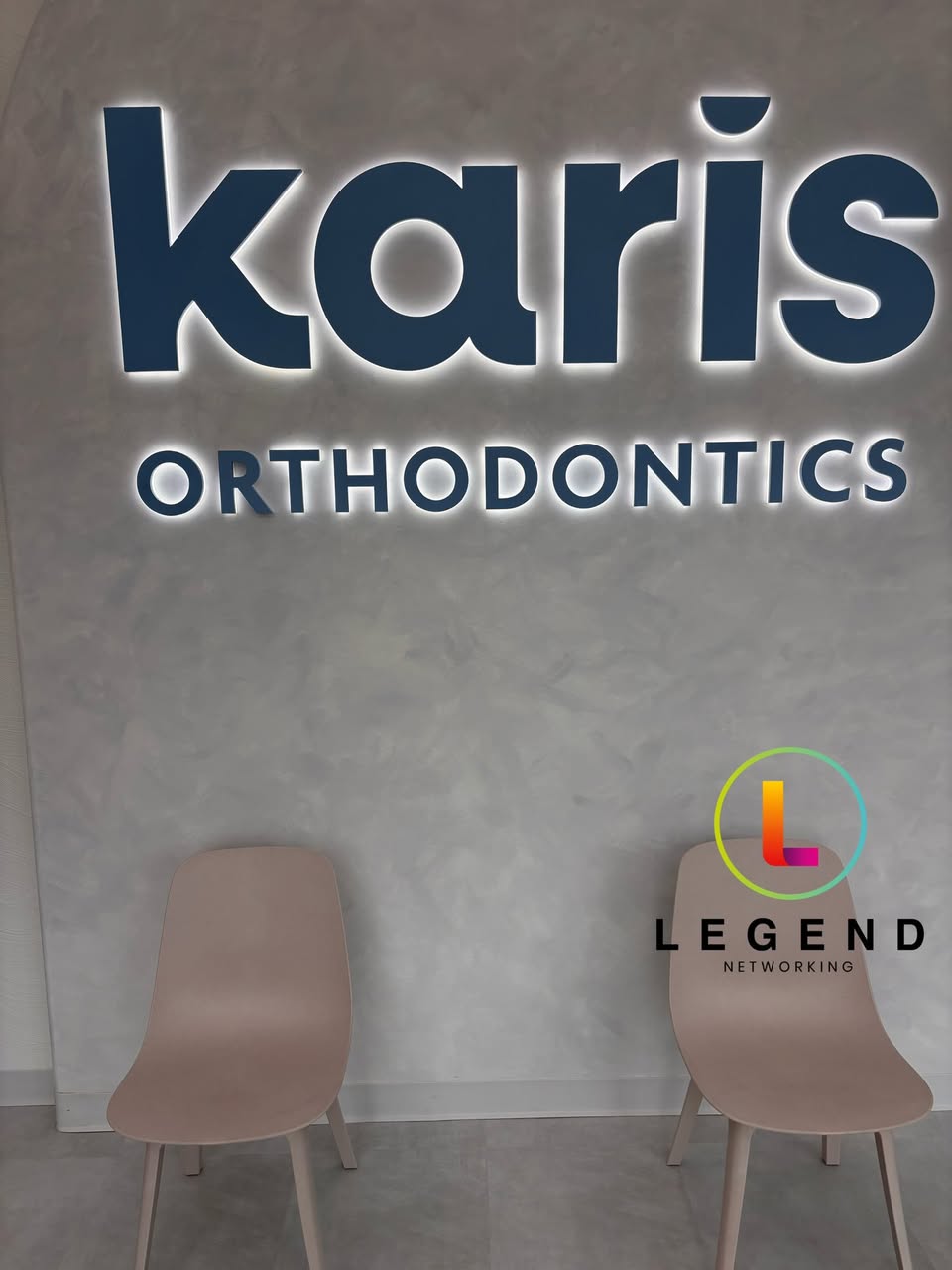 Karis Orthodontics interior sign and seating.